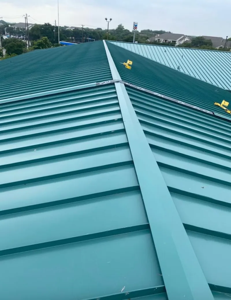 Green commercial metal roof ridge and valley for Metal Roof Repair in Carney
